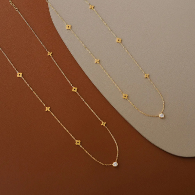 Gold Clover Necklace by CARRIE